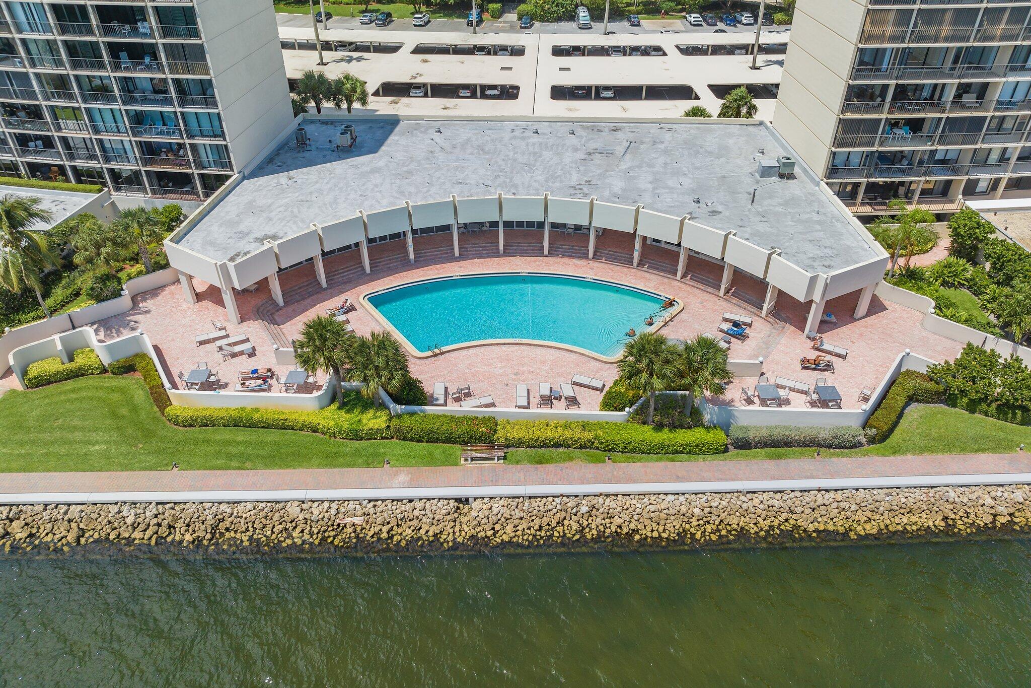 134 Lakeshore Drive, Unit 316 North Palm Beach, FL 33408 - Photo 20 of 30 an aerial view of a house with a garden and lake view