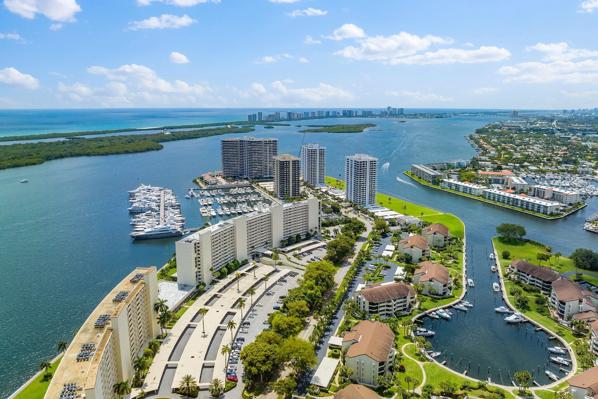 134 Lakeshore Drive, Unit 316 North Palm Beach, FL 33408 - Photo 2 of 30 a view of a lake with couches chairs
