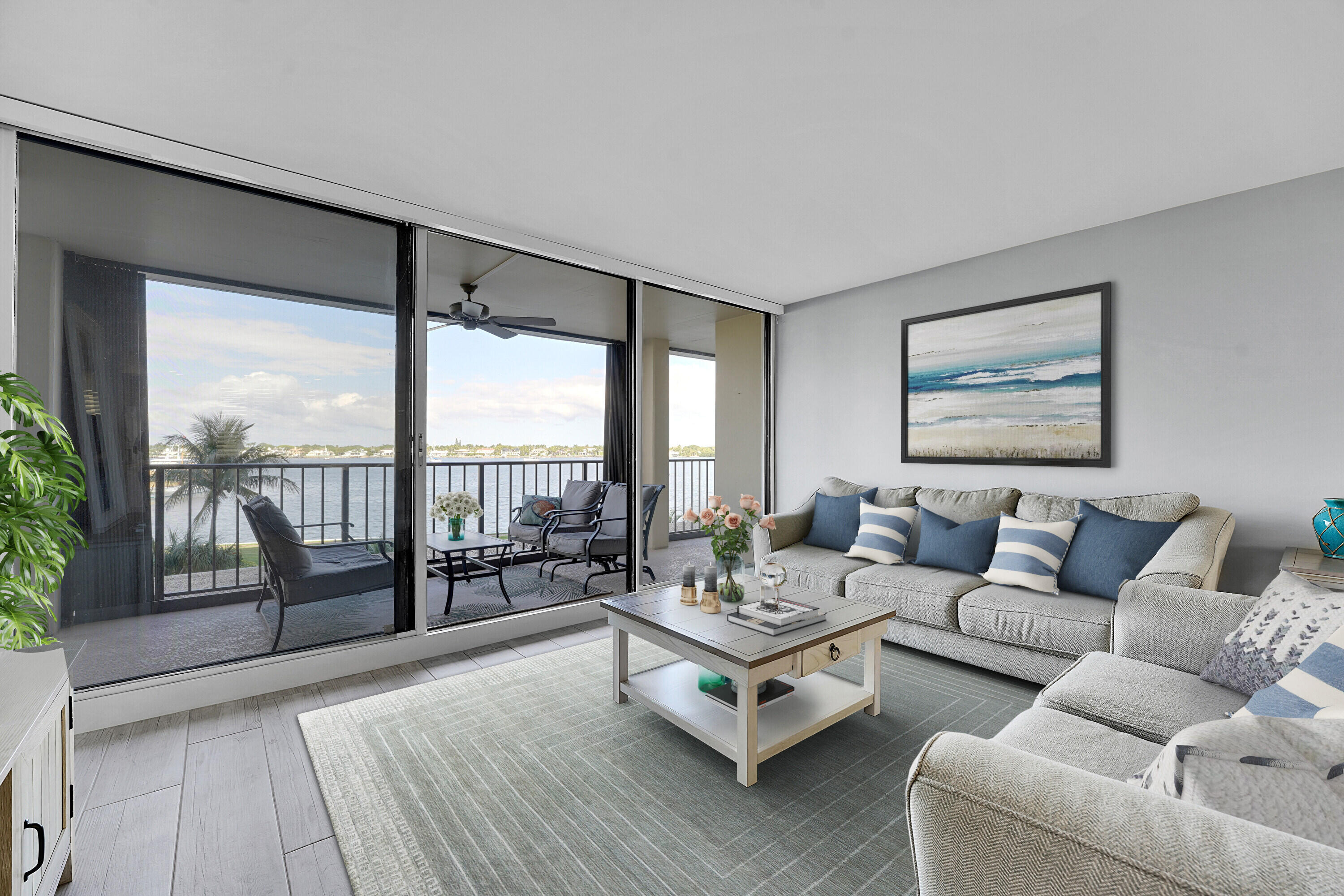 134 Lakeshore Drive, Unit 316 North Palm Beach, FL 33408 - Photo 9 of 30 a living room with furniture and a floor to ceiling window