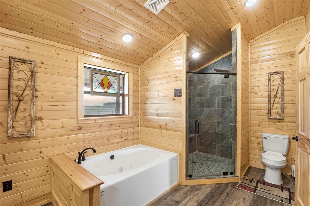 2290 Brooks Lane Sadler, TX 76264 - Photo 27 of 38 a bathroom with a sink a toilet and shower