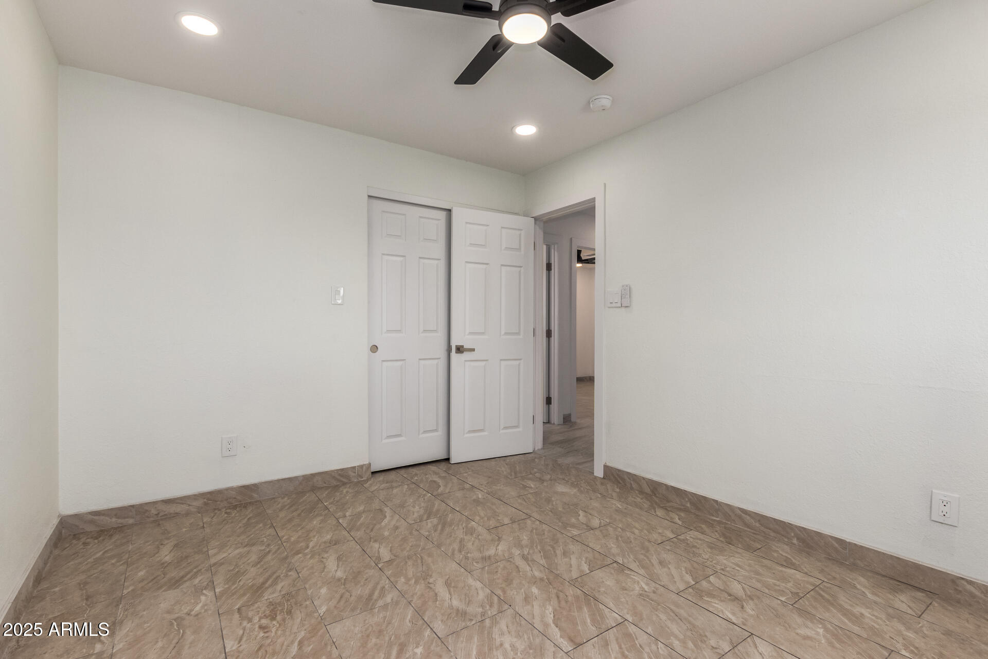2239 West Bethany Home Road Phoenix, AZ 85015 - Photo 17 of 28 a view of an empty room