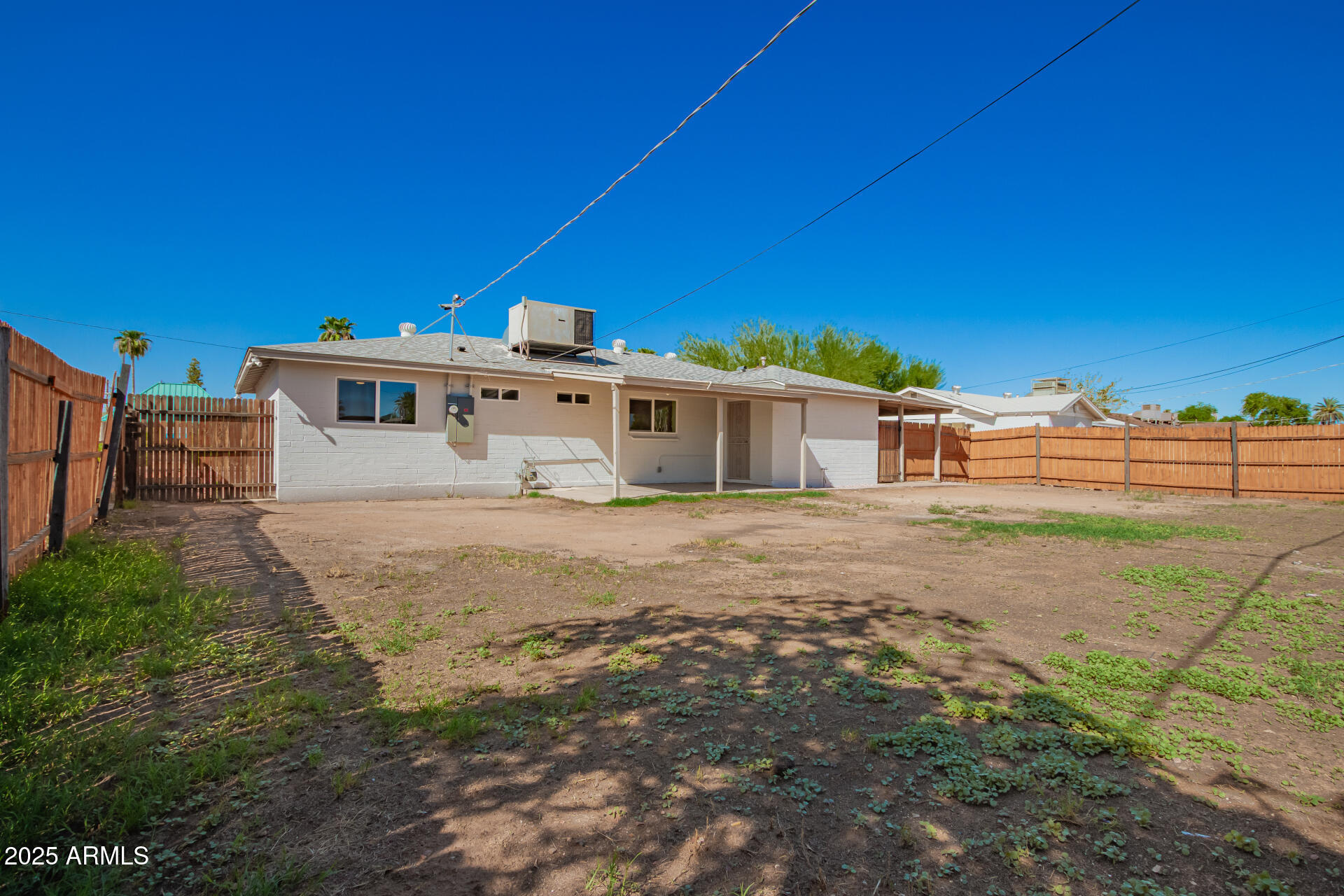 2239 West Bethany Home Road Phoenix, AZ 85015 - Photo 27 of 28 a view of a house with a yard