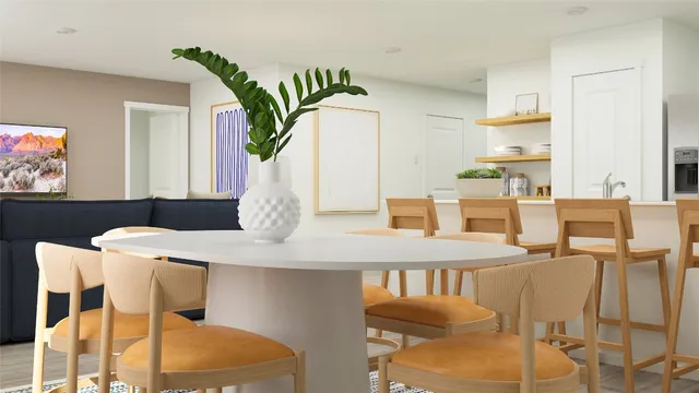 a view of a dining room with furniture