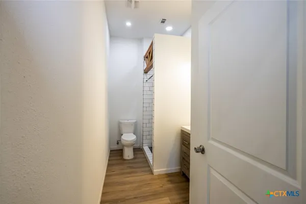 a bathroom with a sink and a toilet