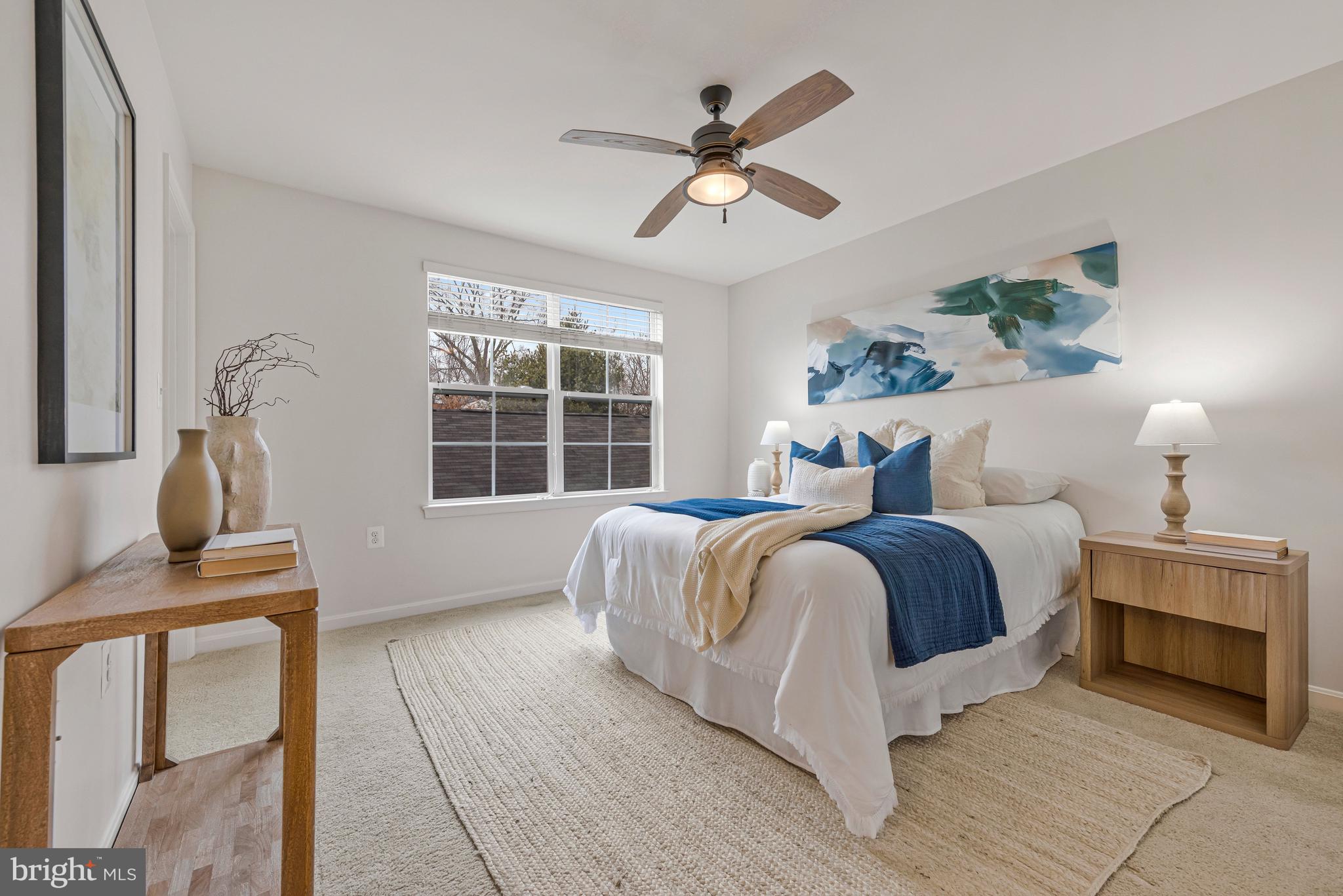 32 Boucher Place Annapolis, MD 21403 - Photo 27 of 72 a spacious bedroom with a bed and a window