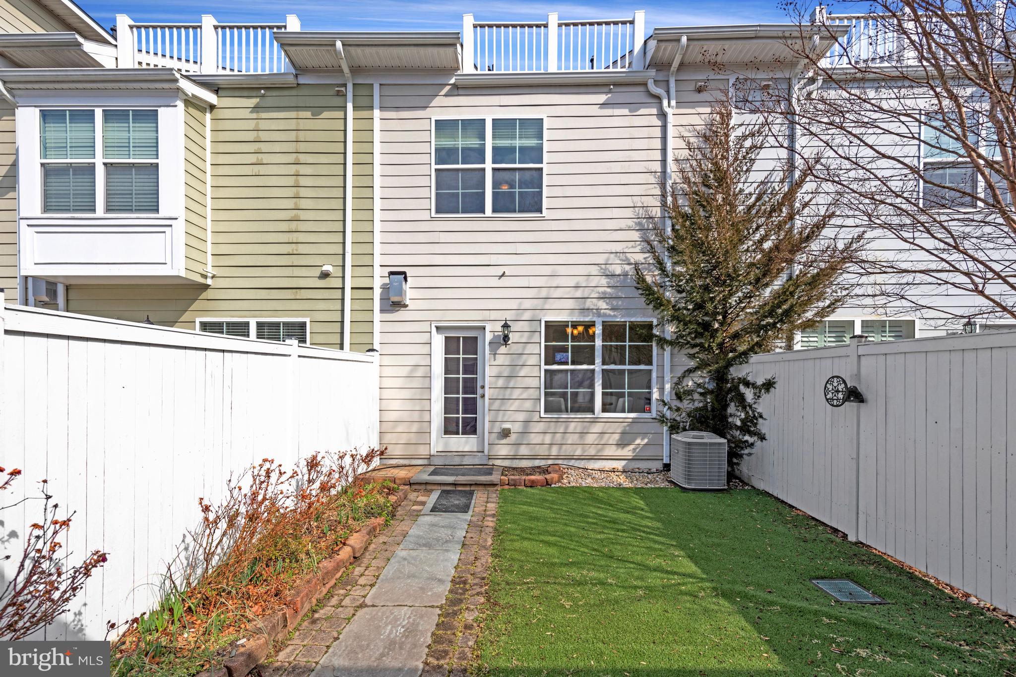 32 Boucher Place Annapolis, MD 21403 - Photo 37 of 72 a front view of a house with a yard