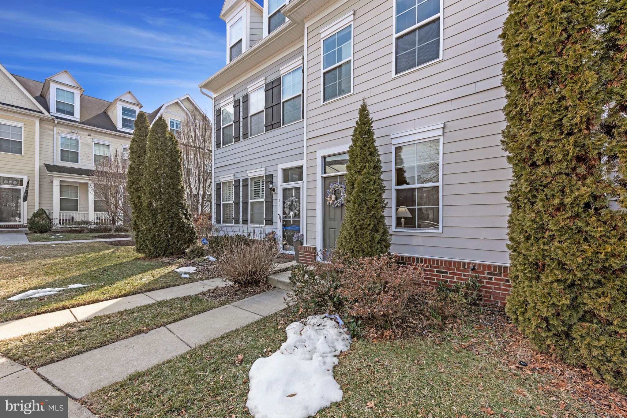 32 Boucher Place Annapolis, MD 21403 - Photo 52 of 72 a view of a brick house with many windows