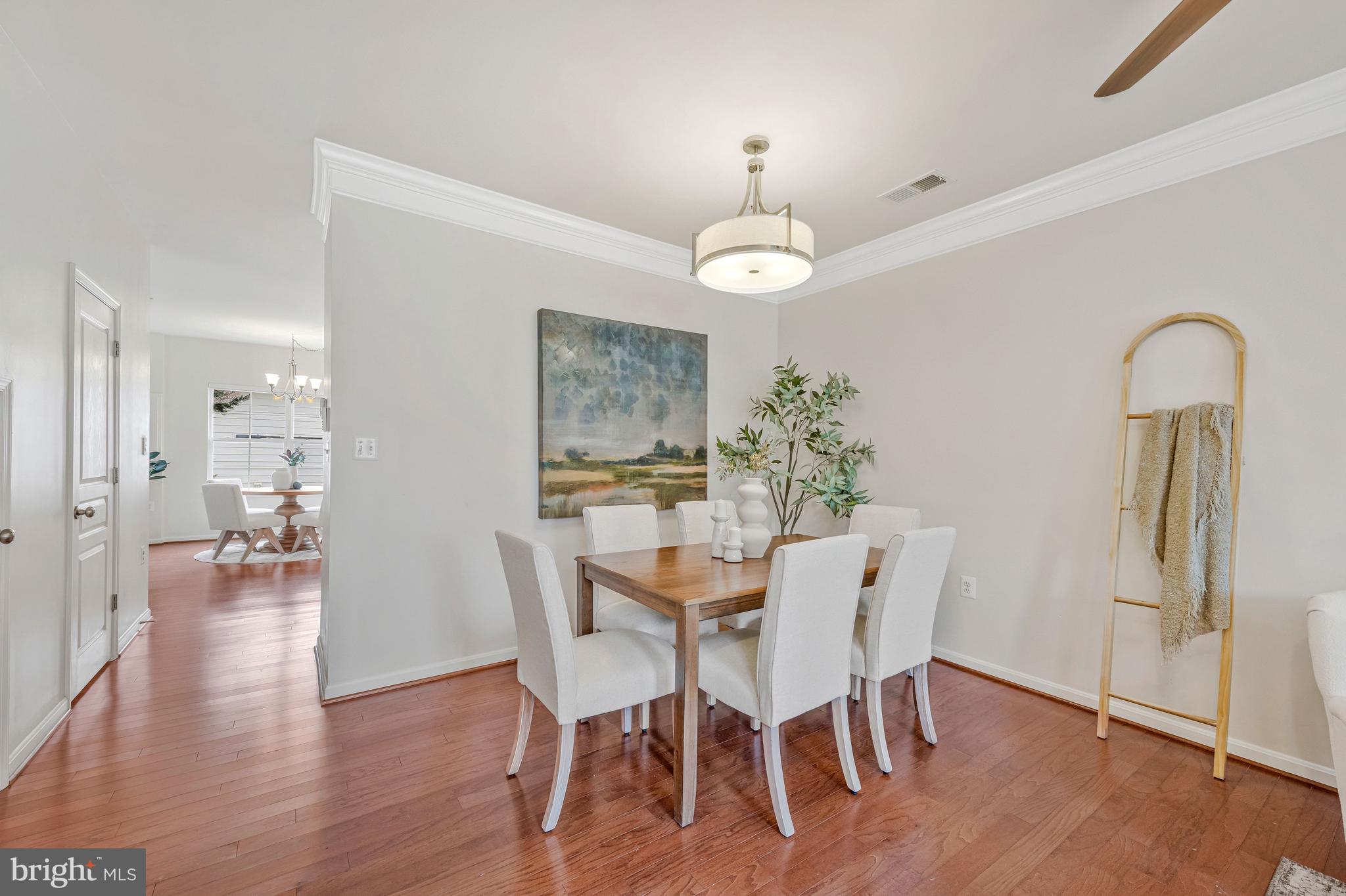 32 Boucher Place Annapolis, MD 21403 - Photo 8 of 72 a view of a dining room with furniture and wooden floor