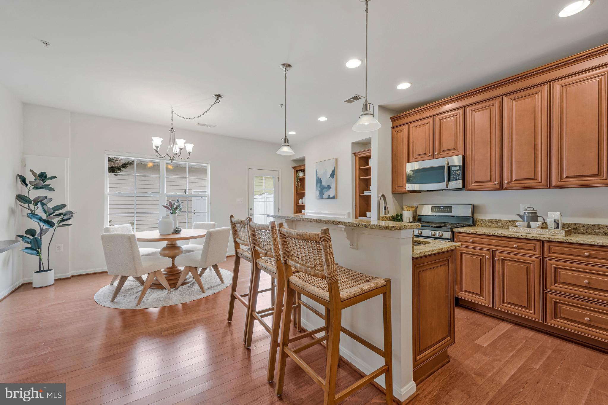 32 Boucher Place Annapolis, MD 21403 - Photo 10 of 72 a view of a dining room with furniture kitchen and wooden floor