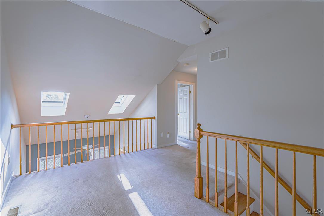 364 Biondo Court Bethlehem, PA 18017 - Photo 11 of 19 a view of a hallway with wooden floor