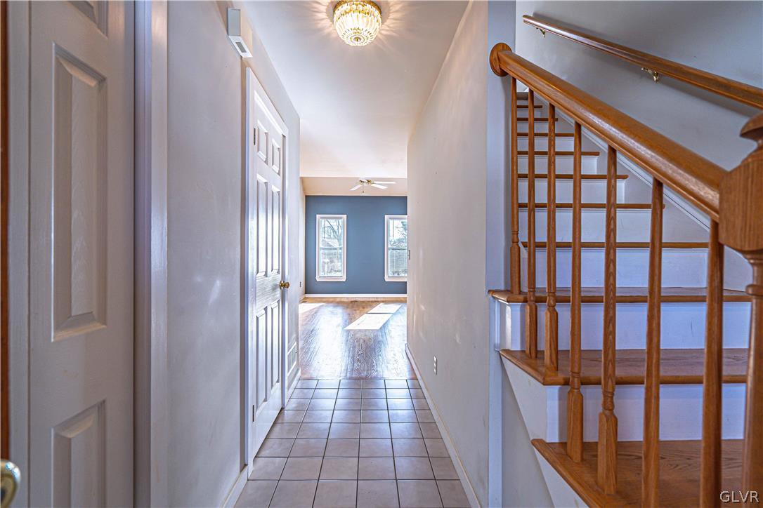 364 Biondo Court Bethlehem, PA 18017 - Photo 3 of 19 a view of a hallway with wooden floor and staircase