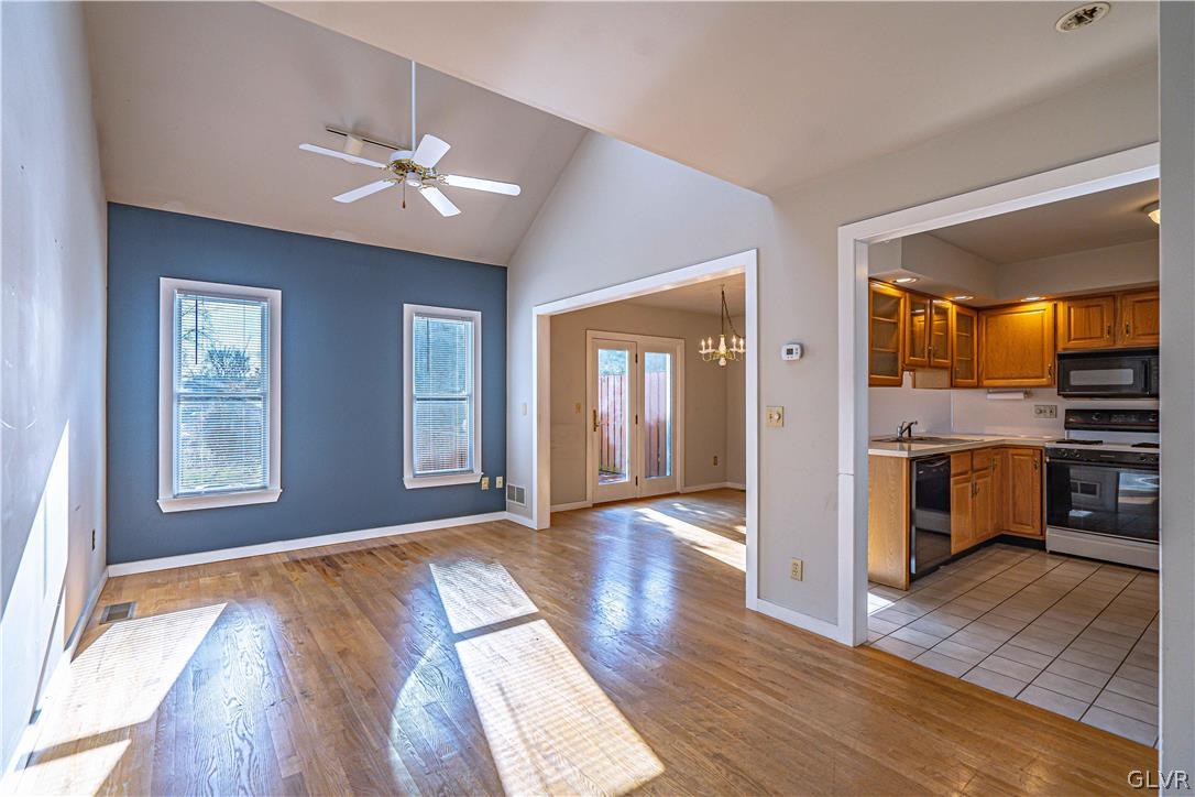 364 Biondo Court Bethlehem, PA 18017 - Photo 4 of 19 a view of an empty room with window and wooden floor