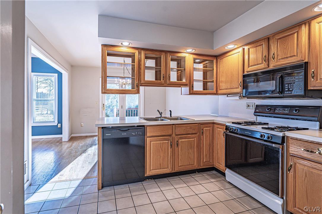 364 Biondo Court Bethlehem, PA 18017 - Photo 6 of 19 a kitchen with stainless steel appliances granite countertop a stove sink and cabinets