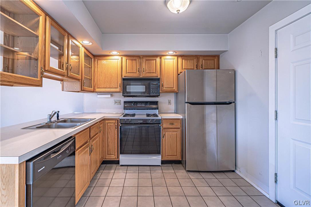 364 Biondo Court Bethlehem, PA 18017 - Photo 7 of 19 a kitchen with stainless steel appliances granite countertop a refrigerator and a sink