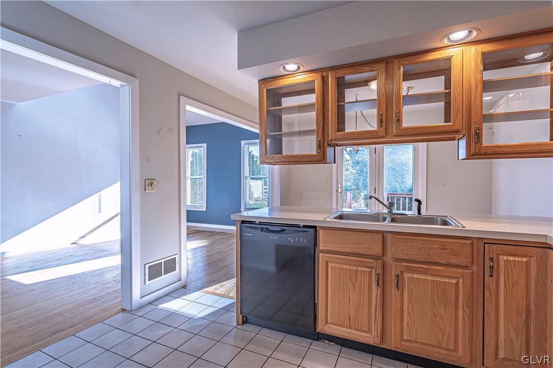 364 Biondo Court Bethlehem, PA 18017 - Photo 8 of 19 a kitchen with stainless steel appliances granite countertop a sink and cabinets