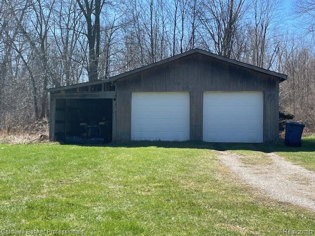 5447 Rensselear Drive Lapeer, MI 48446 - Photo 3 of 22 With room for Tractor, 4 wheelers, sled storage or potting shed