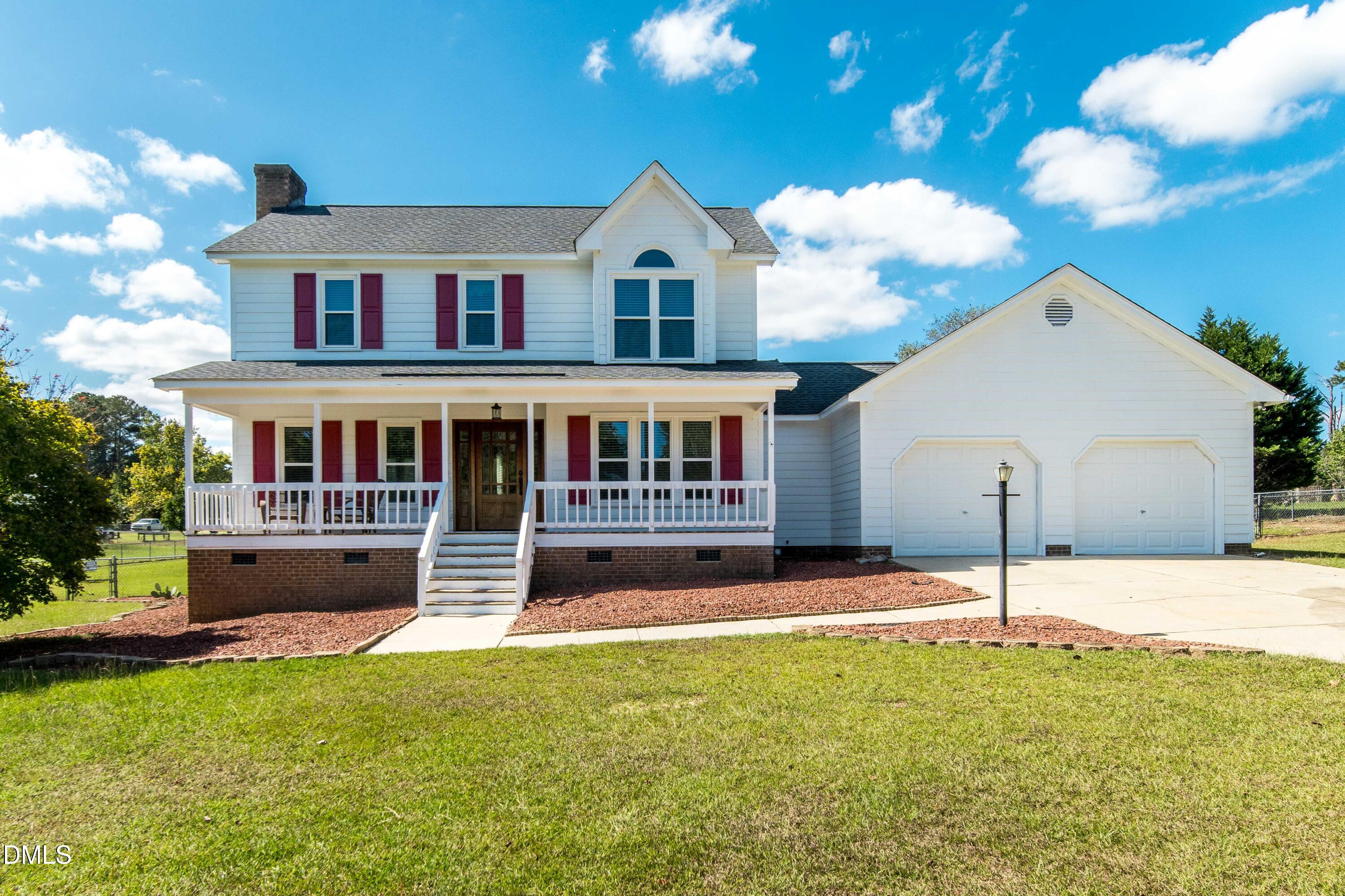 a house view with a garden space