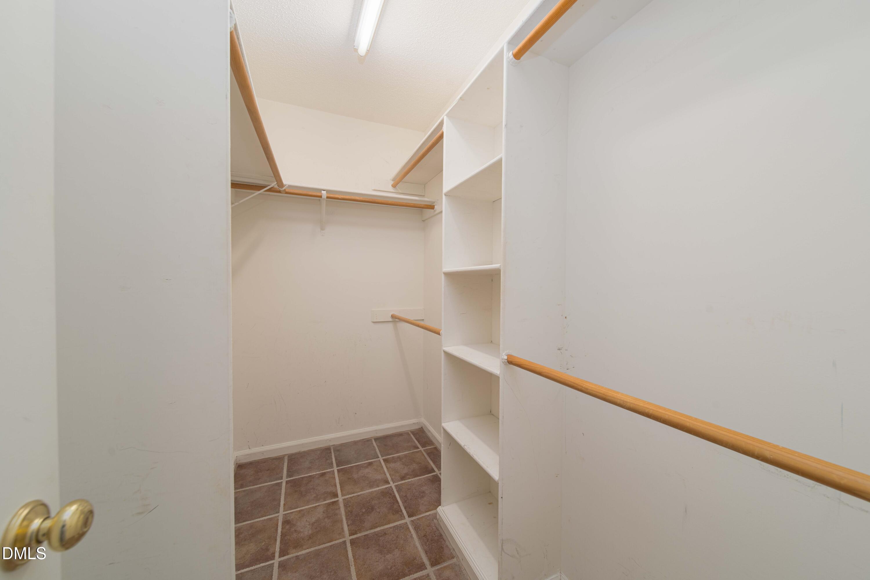 3002 Red Circle Willow Spring, NC 27592 - Photo 18 of 27 a view of an empty walk in closet