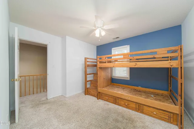 a view of room with ceiling fan