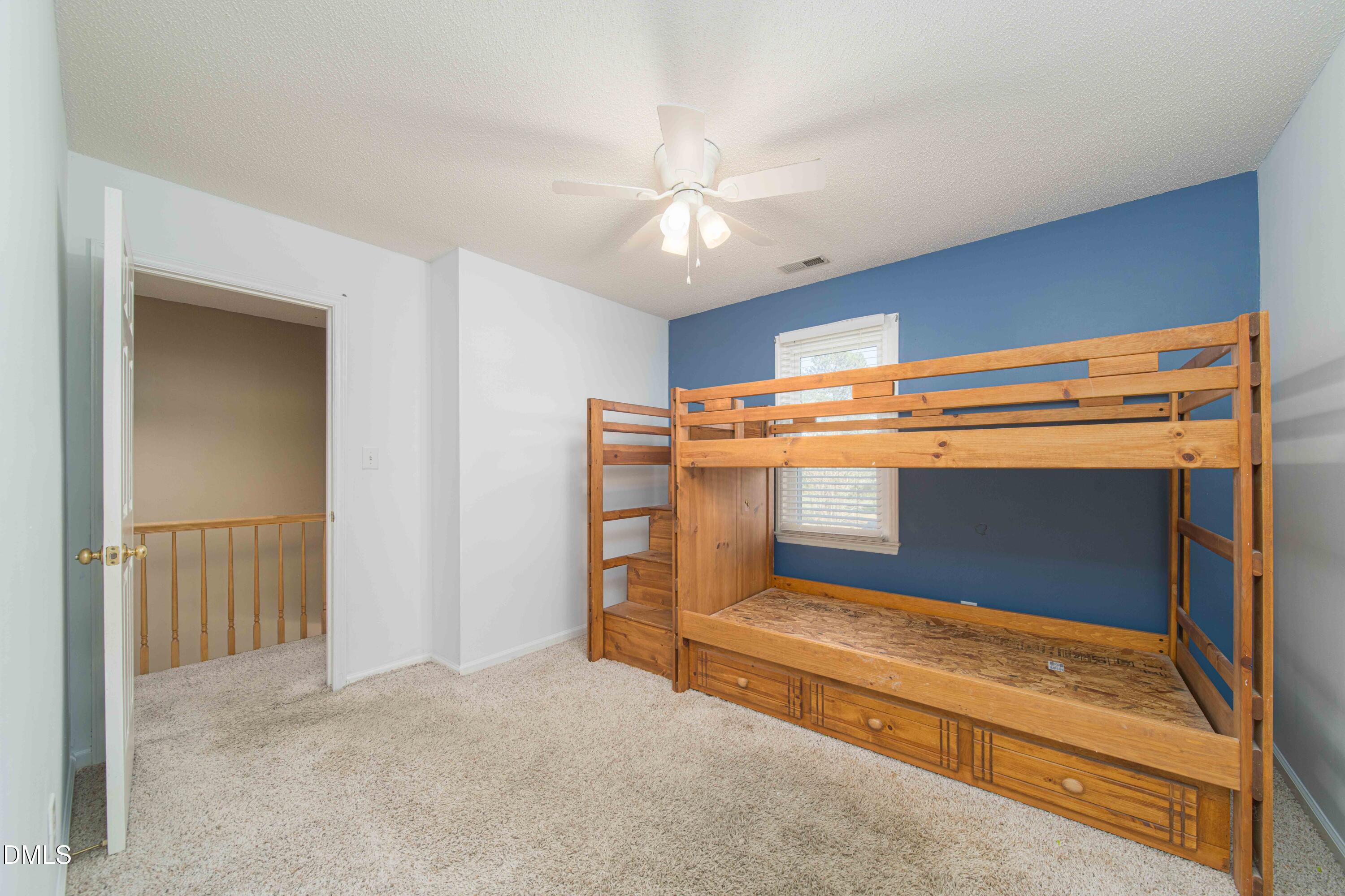 3002 Red Circle Willow Spring, NC 27592 - Photo 23 of 27 a view of room with ceiling fan