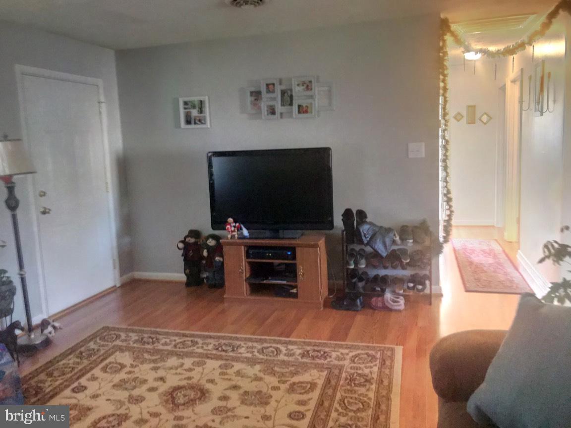 509 Grassdale Street Ranson, WV 25438 - Photo 11 of 28 View of family room from opposite side of entrance