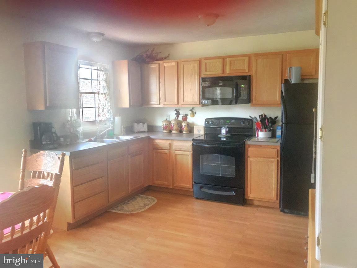 509 Grassdale Street Ranson, WV 25438 - Photo 12 of 28 Kitchen heading in from family room!