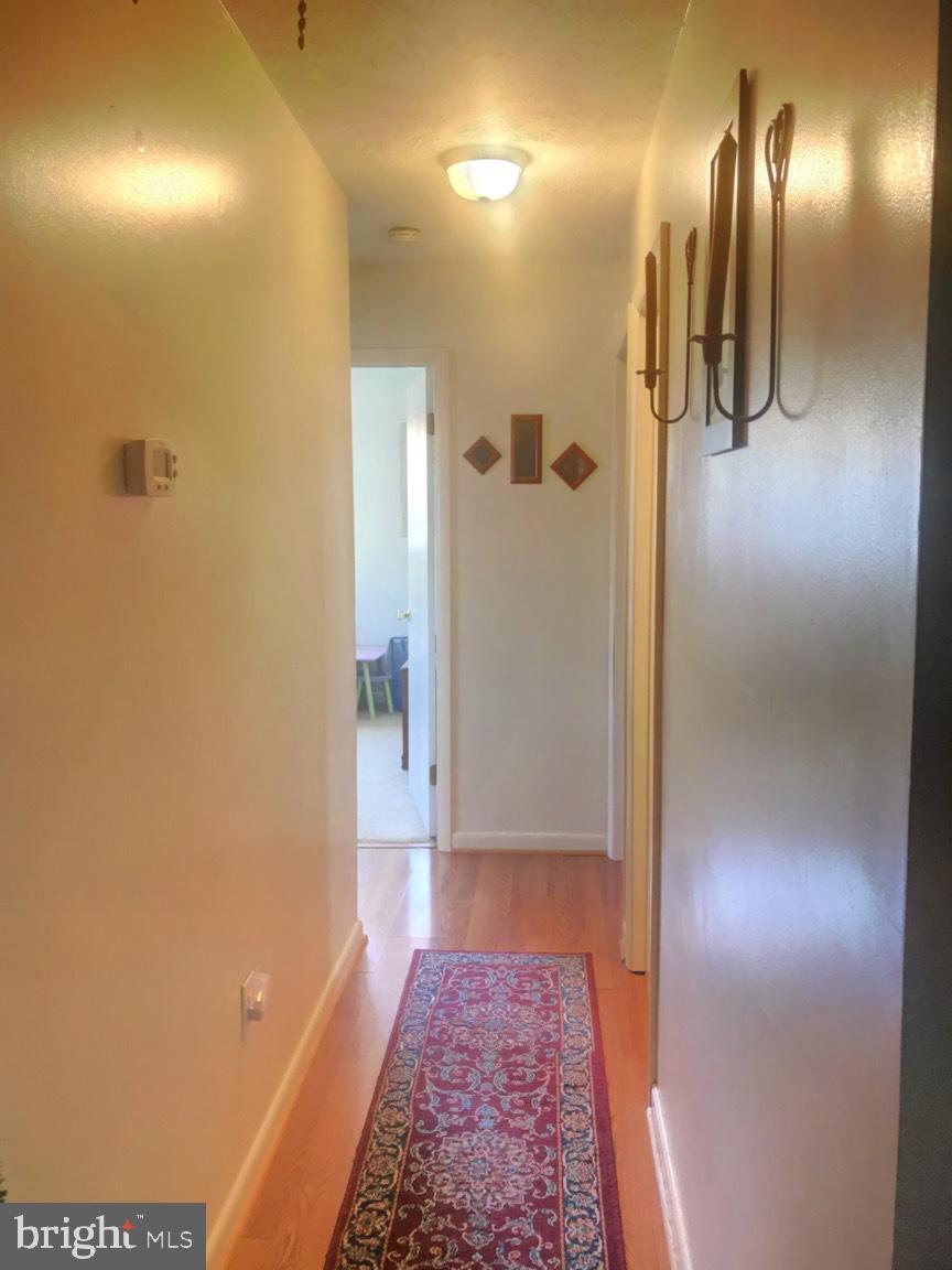 509 Grassdale Street Ranson, WV 25438 - Photo 19 of 28 Open hallway leading to bedrooms and bath!