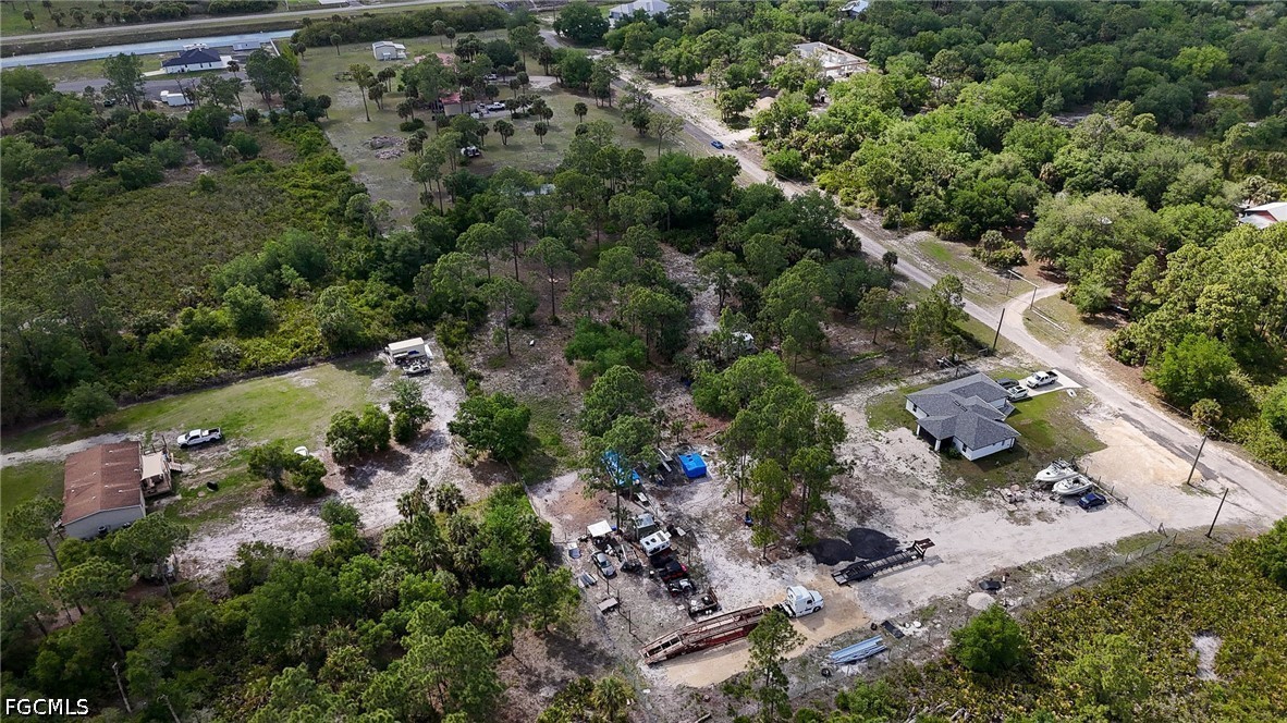 7789 23rd Terrace LaBelle, FL 33935 - Photo 20 of 21 an aerial view of residential house with outdoor space and trees all around
