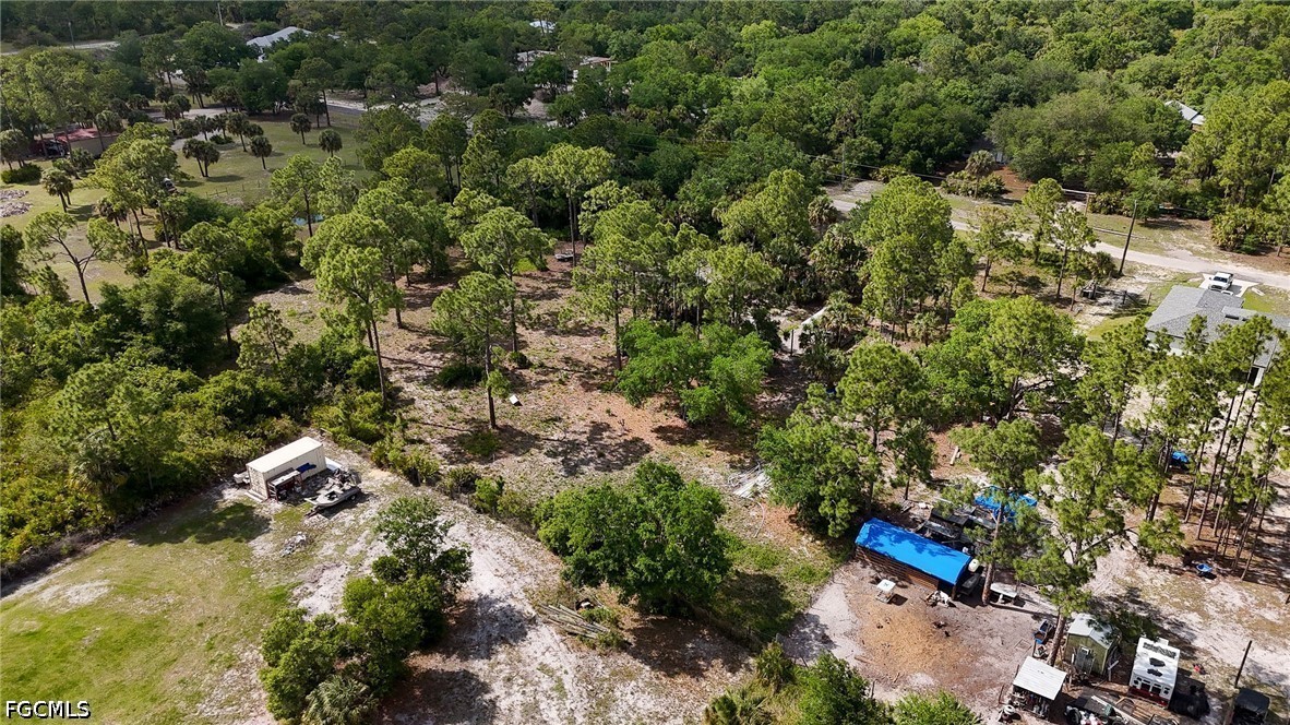 7789 23rd Terrace LaBelle, FL 33935 - Photo 21 of 21 an aerial view of residential house with outdoor space and trees all around