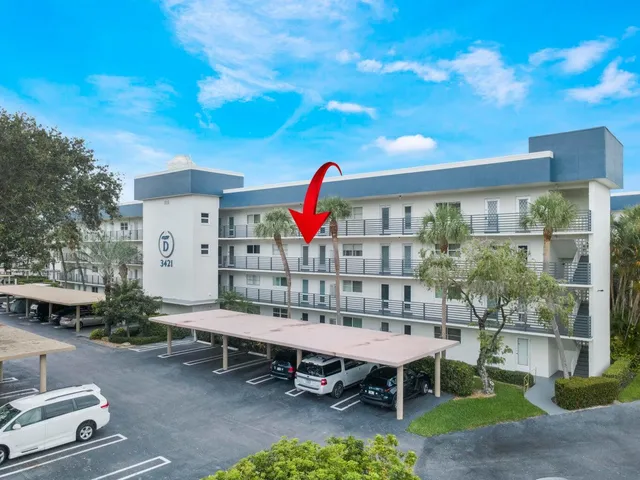 a view of a chairs and table in the patio