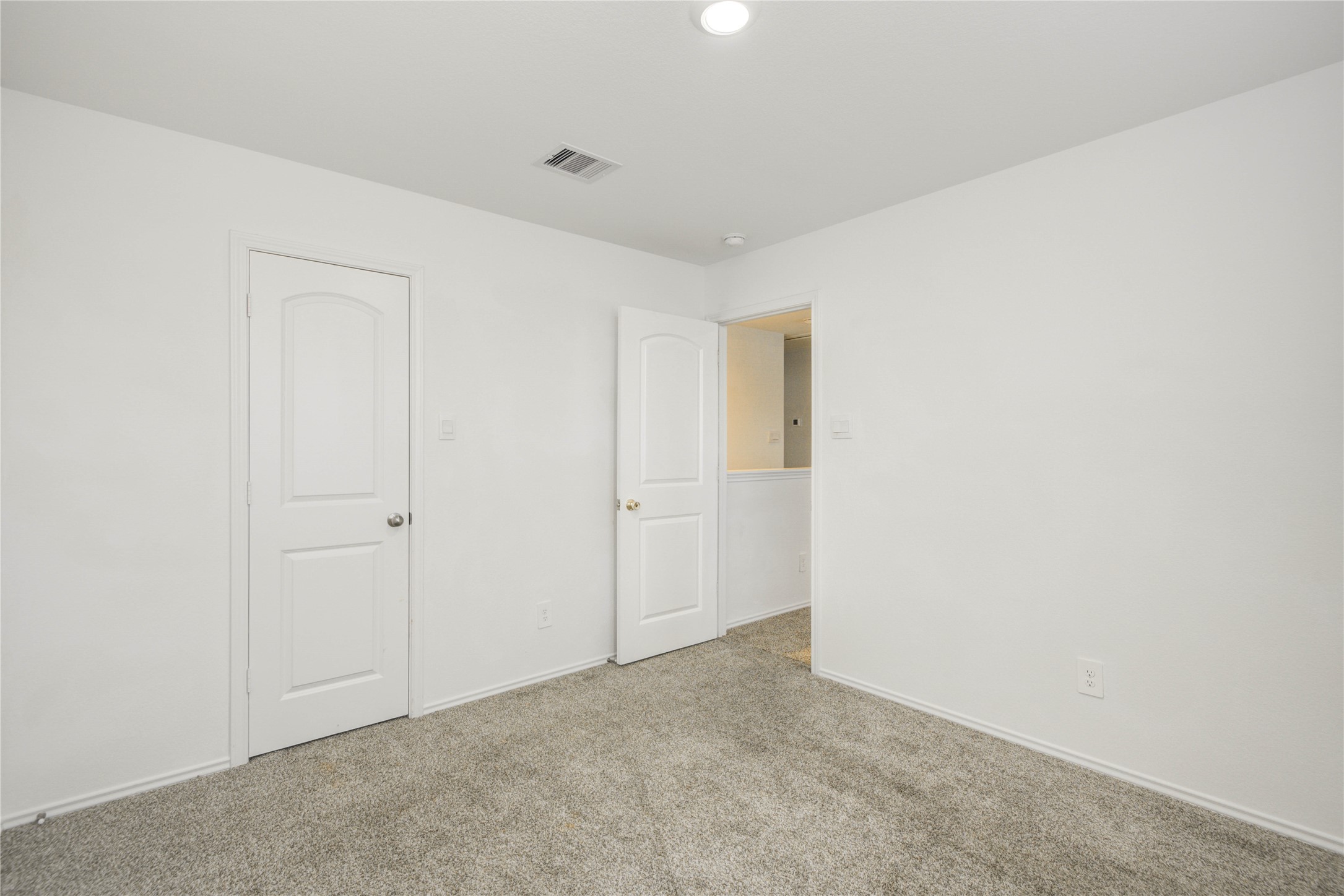22503 Aspen Tarn Trail Spring, TX 77373 - Photo 18 of 28 Spacious secondary bedroom with soft carpet and natural light.