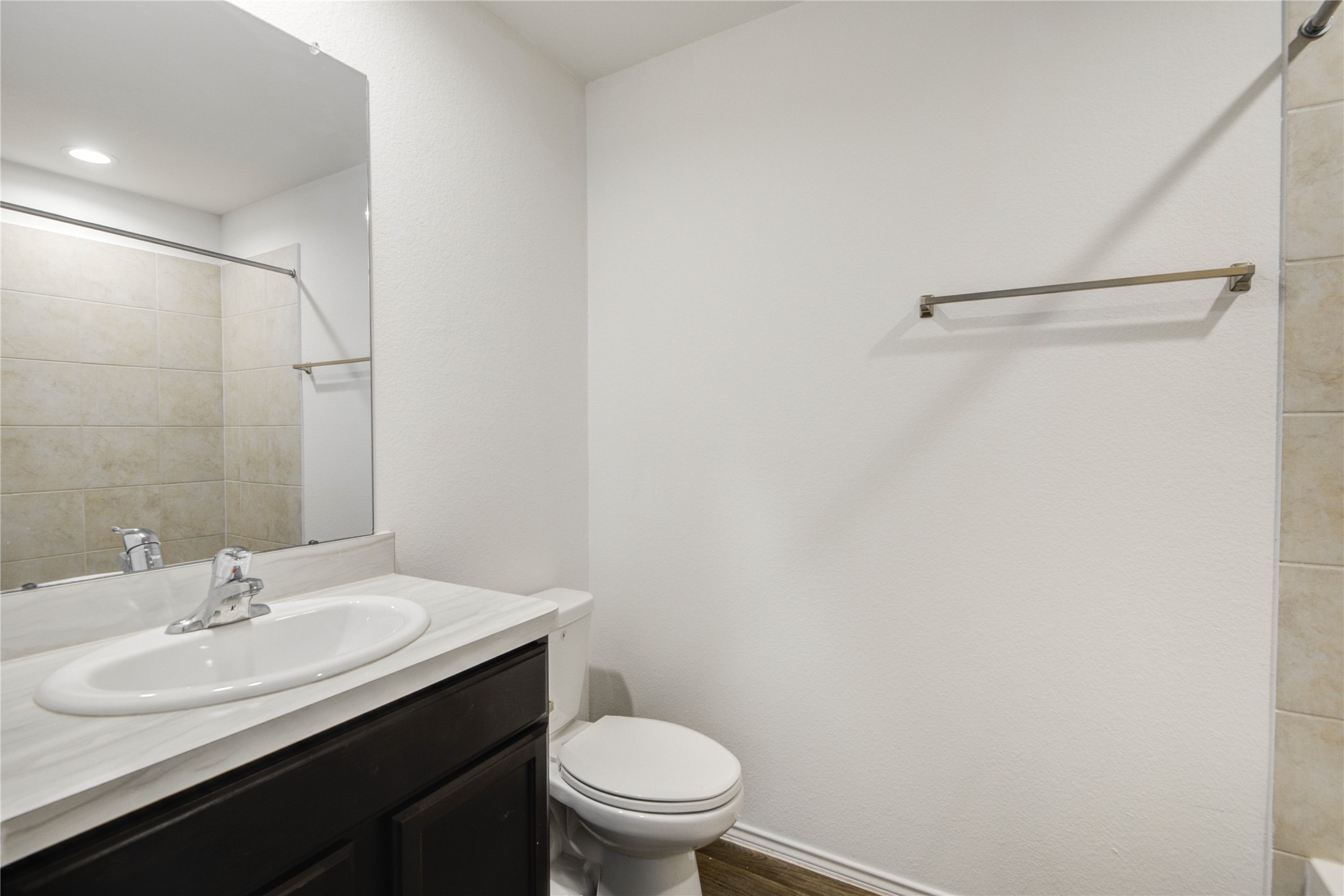 22503 Aspen Tarn Trail Spring, TX 77373 - Photo 19 of 28 Guest bath with sleek vanity and updated fixtures.