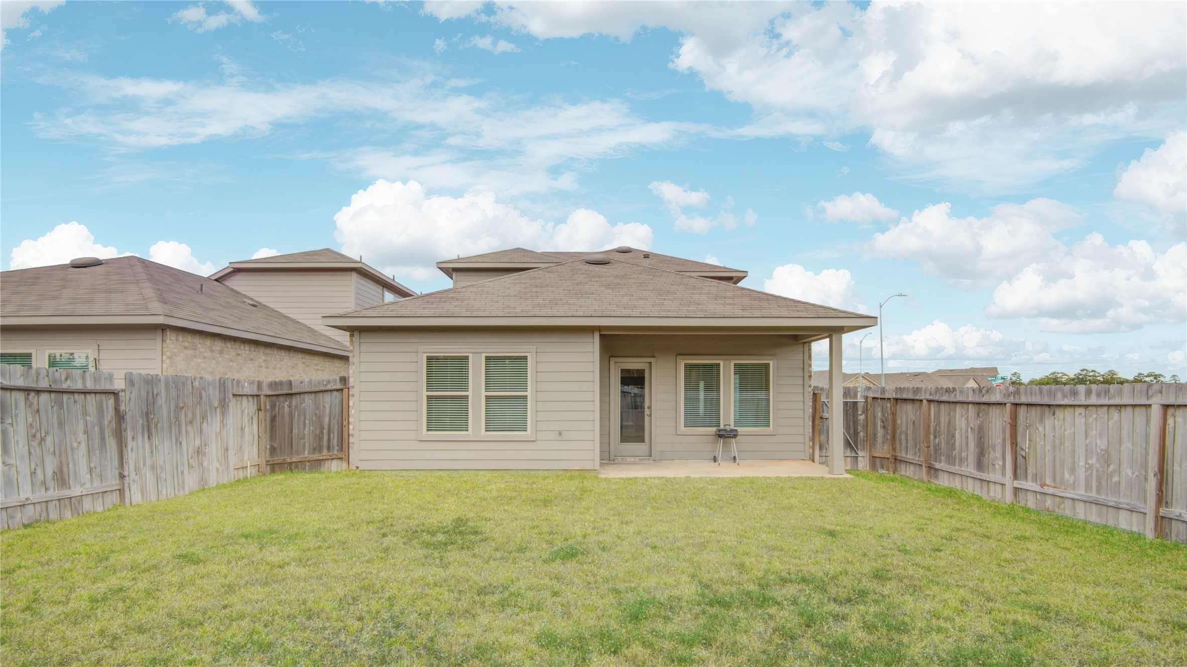 22503 Aspen Tarn Trail Spring, TX 77373 - Photo 25 of 28 Wide backyard with plenty of room for activities or gardening.