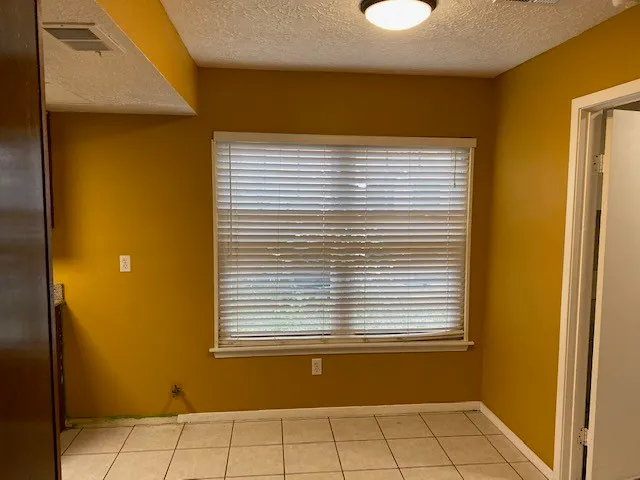 a view of a room with windows