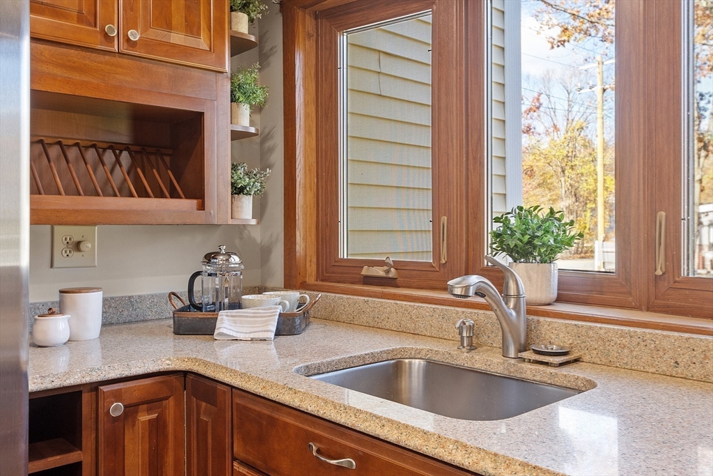 7 Groton-Harvard Road Ayer, MA 01432 - Photo 7 of 35 a kitchen with a sink and a window