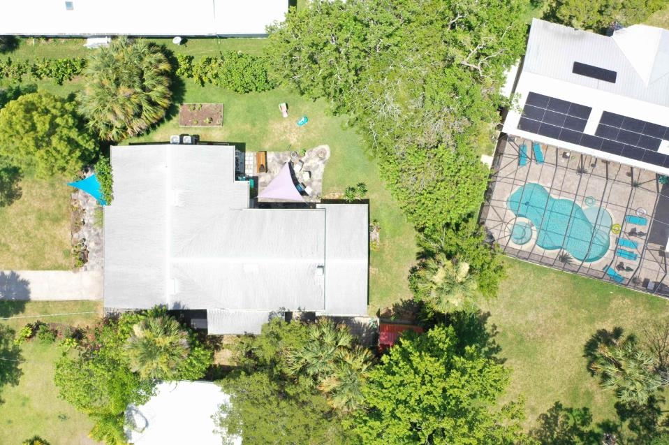 144 Menendez Road St. Augustine, FL 32080 - Photo 2 of 16 Drone / aerial view of a pool