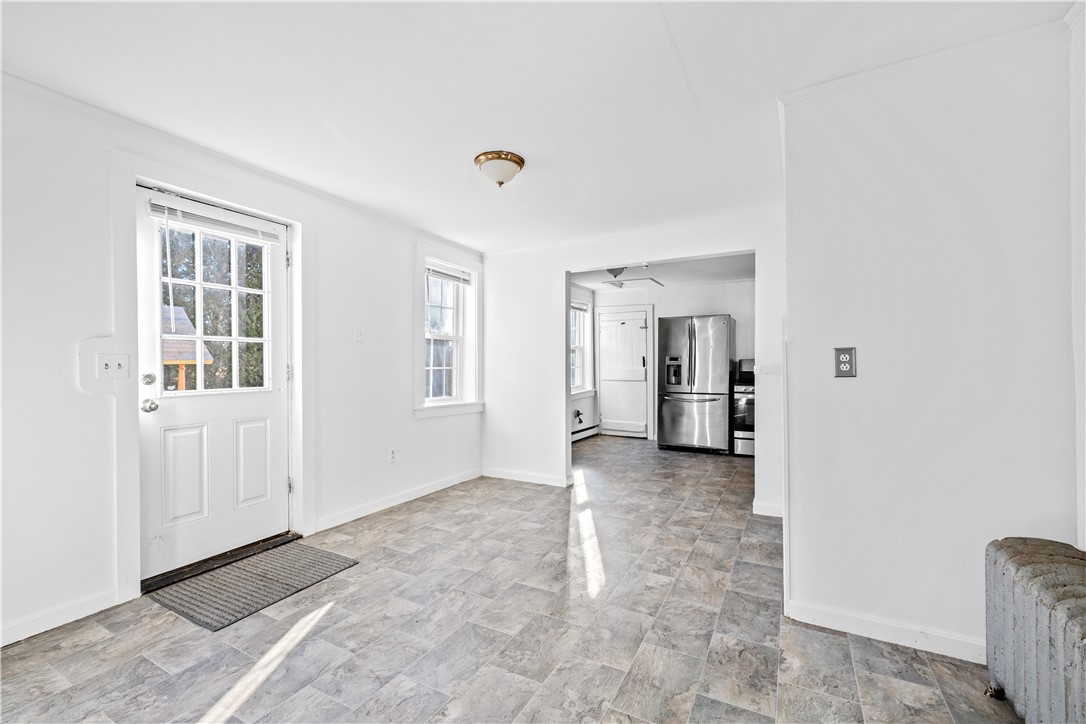 31 Wordell Lane Little Compton, RI 02837 - Photo 7 of 46 Eat-in area and entry door