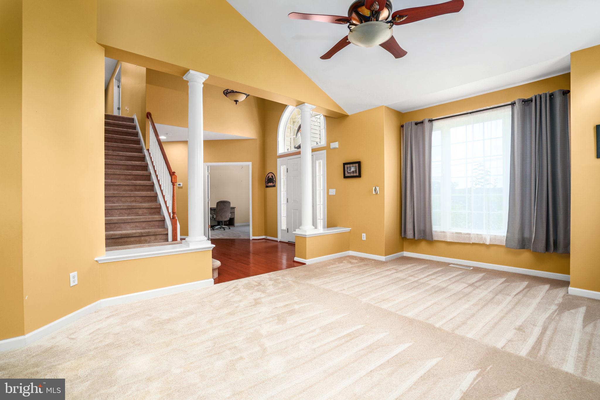 2745 Stockton Road Pocomoke City, MD 21851 - Photo 11 of 57 a view of an empty room with wooden floor and a window
