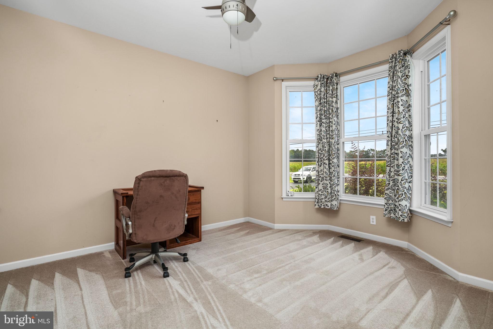 2745 Stockton Road Pocomoke City, MD 21851 - Photo 16 of 57 a room with bed and windows