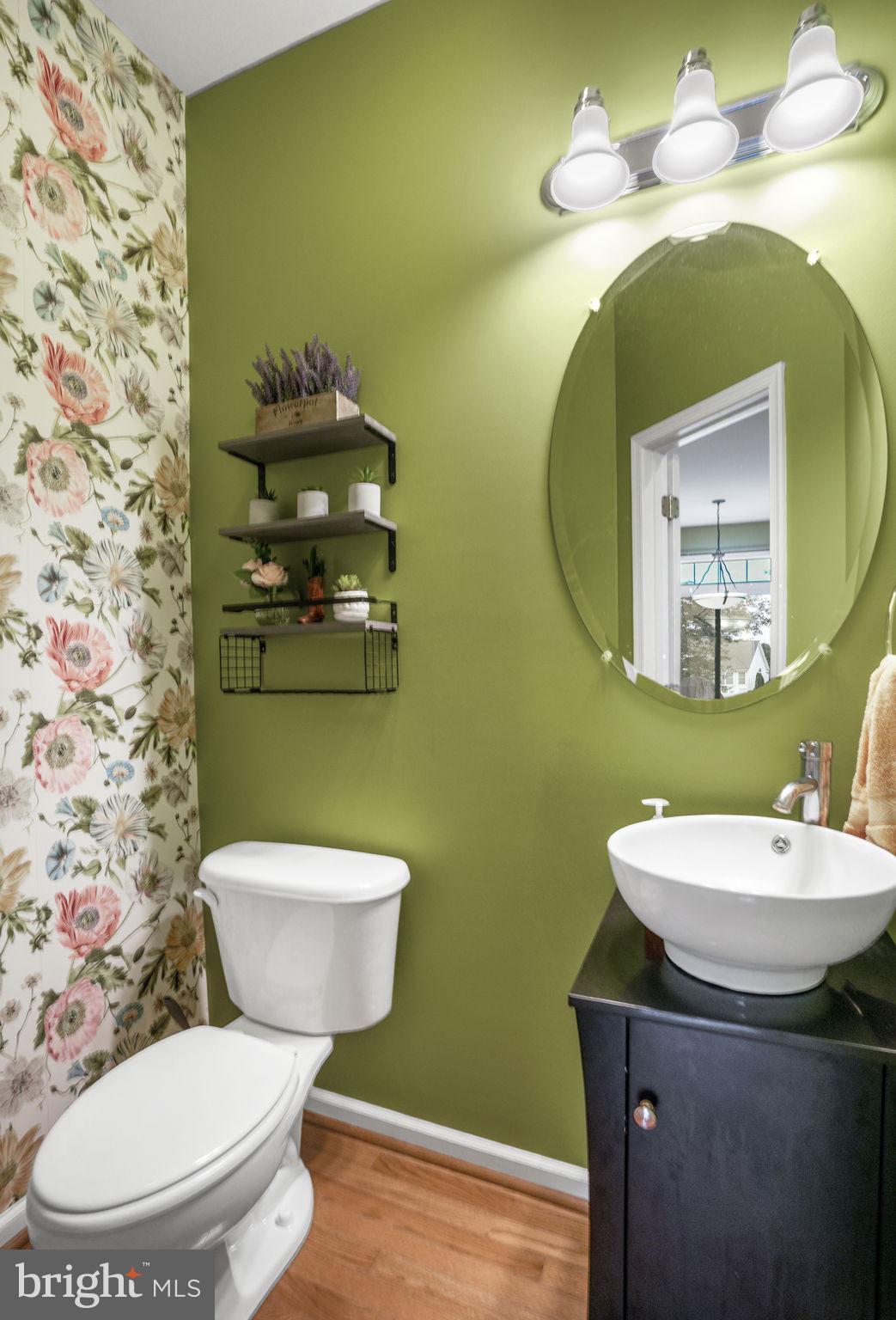 2745 Stockton Road Pocomoke City, MD 21851 - Photo 29 of 57 a bathroom with a toilet sink and mirror