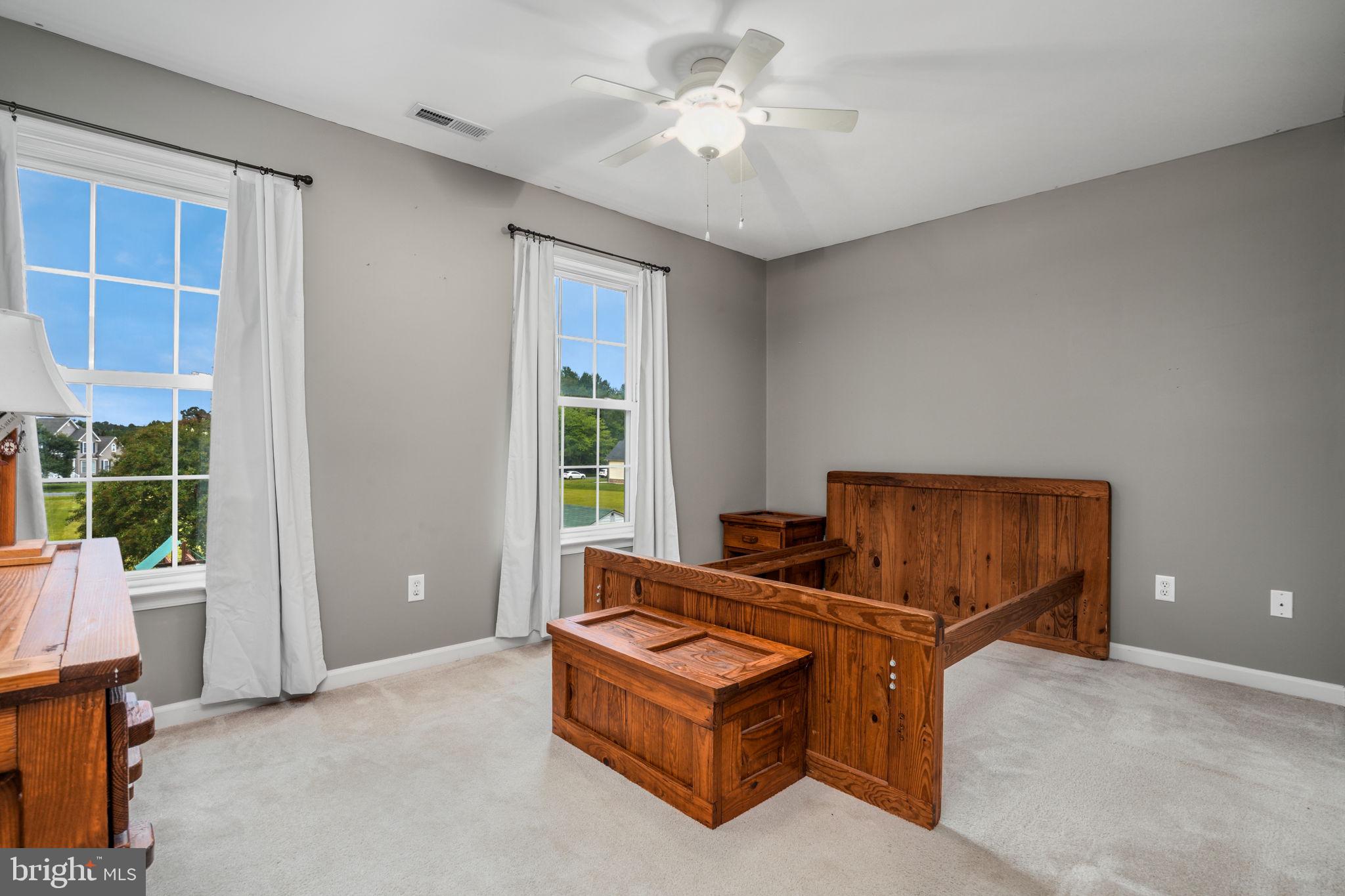 2745 Stockton Road Pocomoke City, MD 21851 - Photo 30 of 57 a living room with furniture and a window