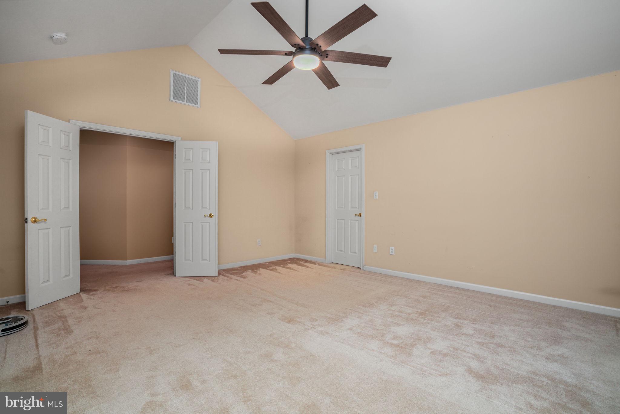 2745 Stockton Road Pocomoke City, MD 21851 - Photo 36 of 57 an empty room with closet and a ceiling fan