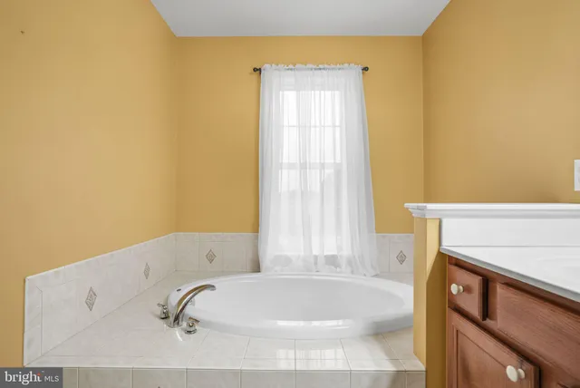 a kitchen with a stove and a microwave