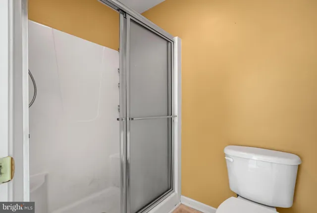 a view of a living room and bathroom