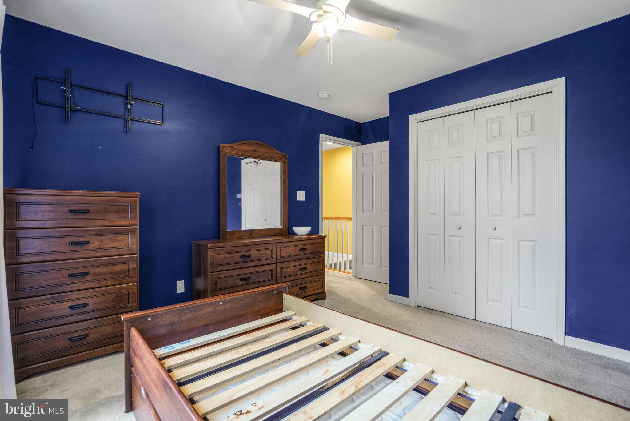 2745 Stockton Road Pocomoke City, MD 21851 - Photo 44 of 57 a bed room with a bed and a dresser