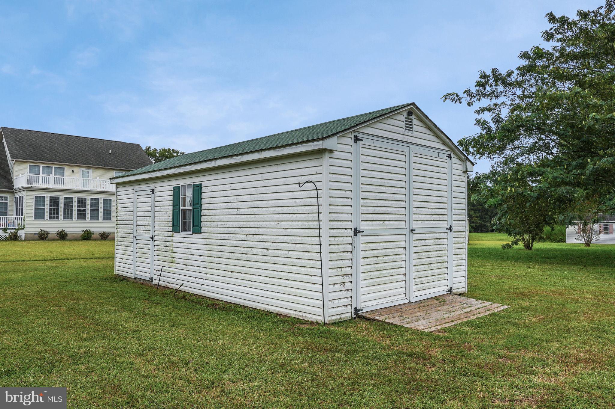 2745 Stockton Road Pocomoke City, MD 21851 - Photo 55 of 57 a view of a house with a yard