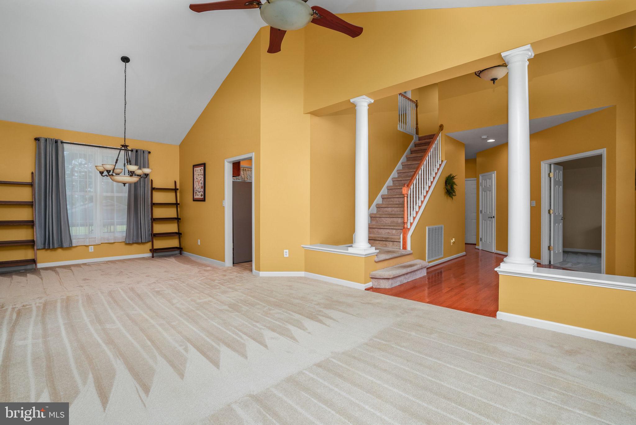 2745 Stockton Road Pocomoke City, MD 21851 - Photo 9 of 57 a view of an entryway with wooden floor windows and a livingroom