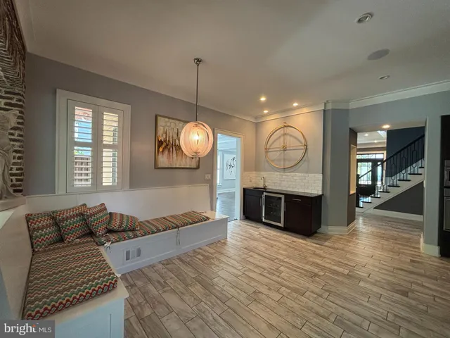 a view of room with wooden floor and outdoor space