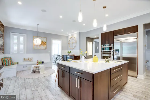 a bedroom with a bed chair and window