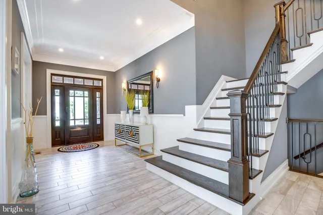 a work room with furniture and a window